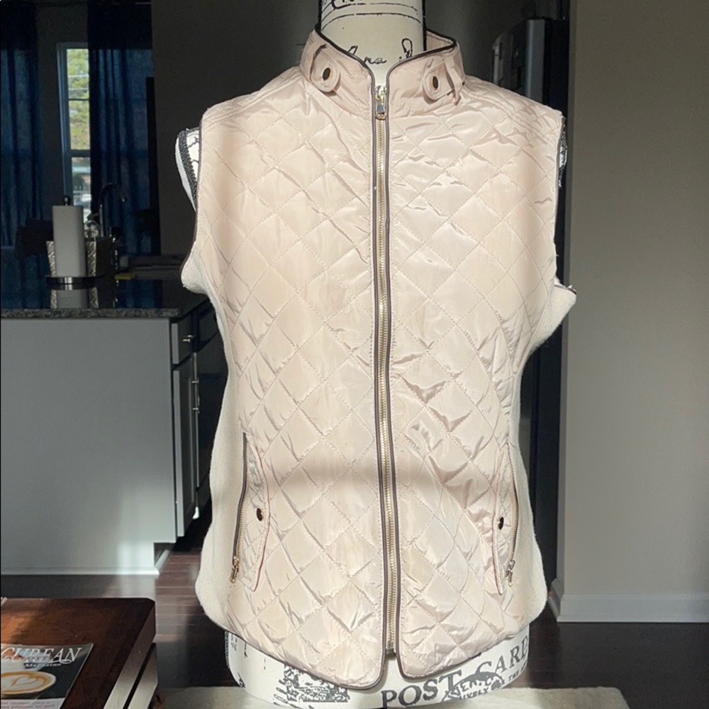 A Rose gold zip up Vest from Cavalini.